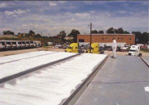 Applying Super Therm® to Pacific Trucking roofs