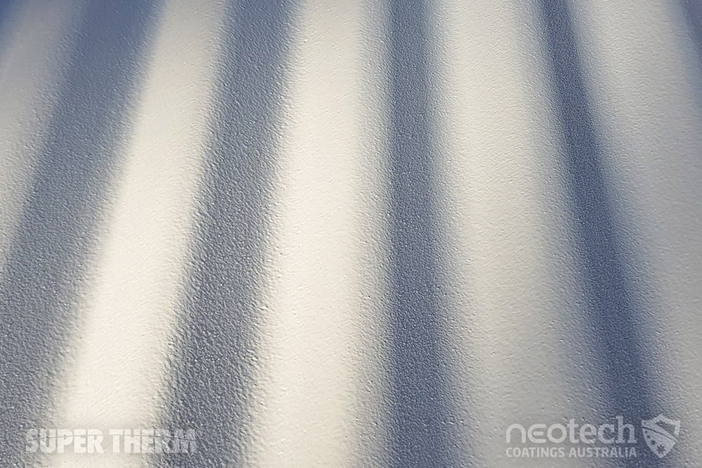 Texture of Super Therm® close up by airless sprayer